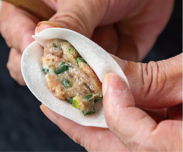Hand-wrapping gyoza in an ultra-thin skin
